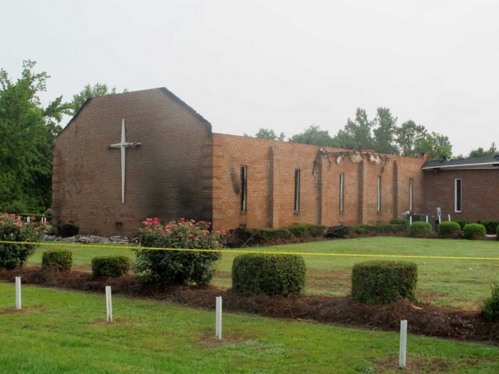 The Mount Zion AME Church in Greeleyville, S.C., is seen on Wednesday, July 1, 2015, after it was heavily damaged by fire. The church was the target of arson by the Ku Klux Klan two decades ago but a law enforcement source told The Associated Press that the most recent fire was not arson. (Photo: Bruce Smith/AP)