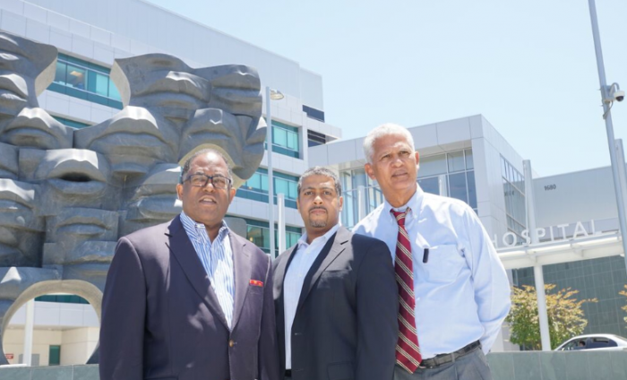 (from left to right) Supervisor Mark Ridley-Thomas, Chief Medical Officer at Martin Luther King Jr. Community Hospital and Chief Strategy Officer Jim Lott at the brown paper bag luncheon.