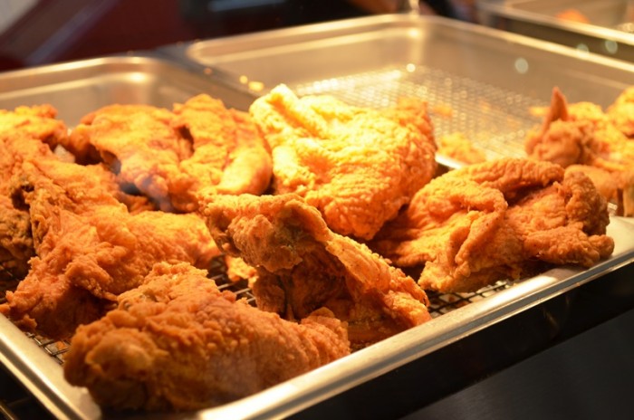 Caption 2: Crispy fried chicken served at Krispy Krunchy Chicken restaurant in the Crenshaw mall.