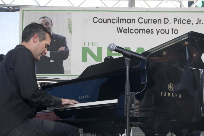 Mayor Eric Garcetti showed his musical side playing a piece to the astonished Central Avenue crowd. (Troy Tieuel/LA Sentinel)