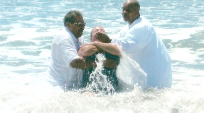 Converts to Christ are baptized at the Disciples on the Move Gospel Crusade Rally.