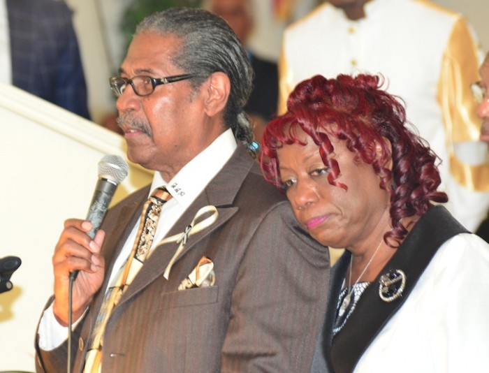 Rev. Dr. James Perkins and Mrs. Roslyn Sherrill, Grundy's father and sister, share memories of Rickey. (Bobby Washington photo)