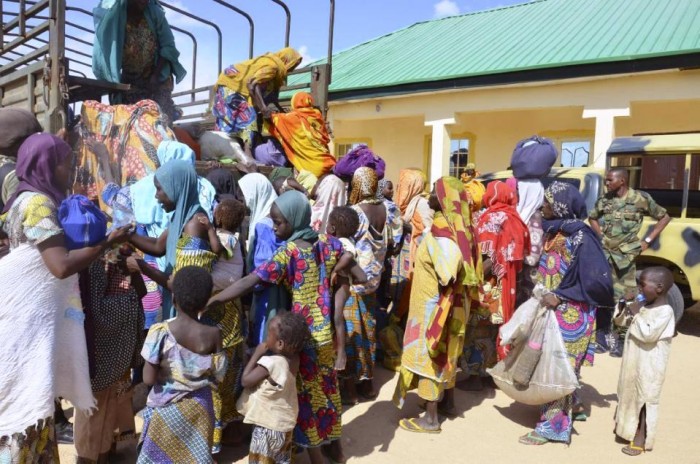 In this Thursday, July. 31, 2015 file photo, women and children rescued by Nigerian soldiers from Boko Haram extremists in the northeast of Nigeria arrive at the military office in Maiduguri. Nigerian troops rescued 178 people from Boko Haram in attacks that destroyed several camps of the Islamic extremists in the northeast of the country, an army statement said Sunday, Aug. 2. Spokesman Col. Tukur Gusau said that 101 of those freed are children, along with 67 women and 10 men. (AP Photo/Jossy Ola file)