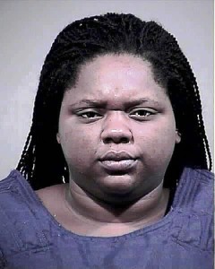 This handout photo provided by the Charles County, Md. Sheriff's Office shows Romechia Simms. A Maryland woman who was found pushing her dead son in a playground swing earlier this year has been indicted and charged with manslaughter and child abuse, authorities announced Monday. (Charles County, Md. Sheriff's Office via AP)