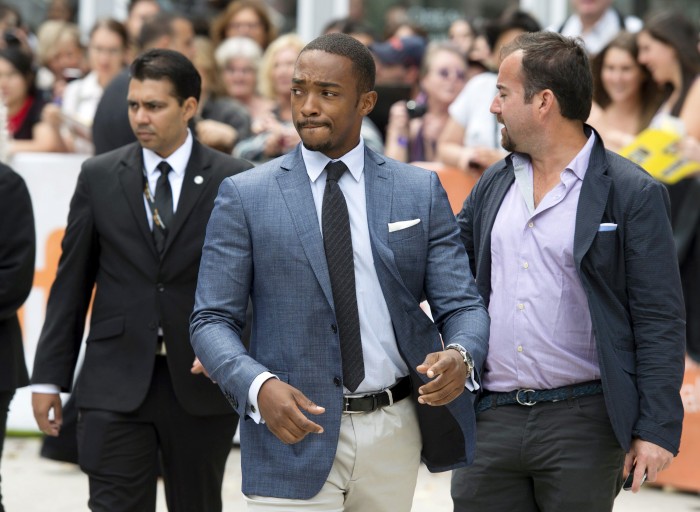 Anthony Mackie arrives at the premier of the film "Black and White" during the 2014 Toronto International Film Festival in Toronto on Saturday, Sept. 6, 2014. (AP Photo/The Canadian Press, Darren Calabrese)