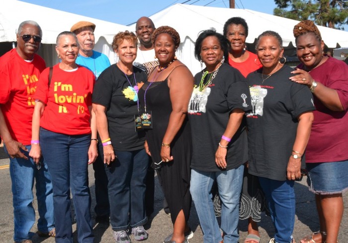 Holman UMC Pastor Kelvin Sauls (5th from left) and Rev. Judi Wortham Sauls (6th from left) join Holman UMC volunteers. (photo by Danelle Cunningham)