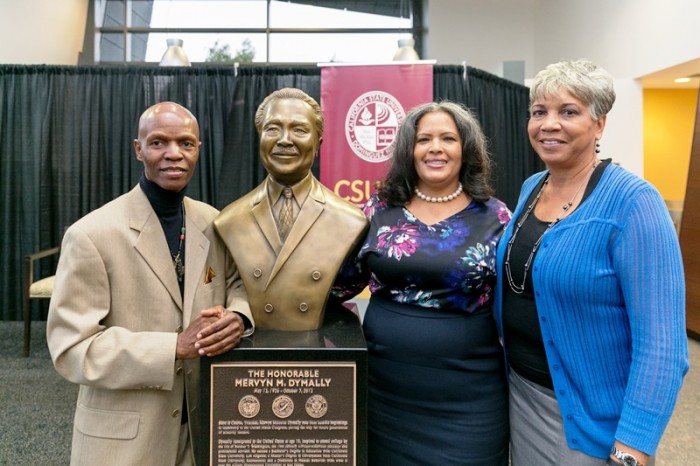 Mervyn M. Dymally bust sculptor Nijel Binns, Dymally's daughter Lynn, and Brenda Riddick, director of the Mervyn M. Dymally African American Political and Economic Institute. (Photo by Nate Brown/CSUDH)