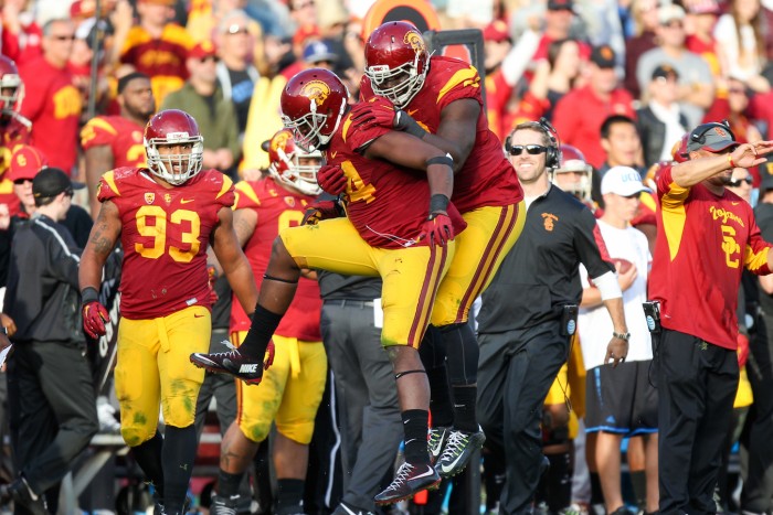 Trojans Defense Celebrates! Photo:  Jordon Kelly