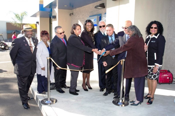 Celebrating the Chase Ribbon Cutting: (L-R) Compton Treasurer Doug Sanders, Compton School Board Member Mae Thomas, Chase Bank District Director, Compton Councilwoman Janna Zurita, Compton Mayor Aja Brown, Compton Renaissance Developer Danny J. Bakewell, Sr., Chase Branch Manager Moses Villanueva, Compton Renaissance Developer Lonnie R. Bunkley, Councilwoman Emma Sharif and Council Representative Dedra Duhar (Councilwoman Yvonne Arceneaux).   – Photo by Valerie Goodloe for Sentinel  