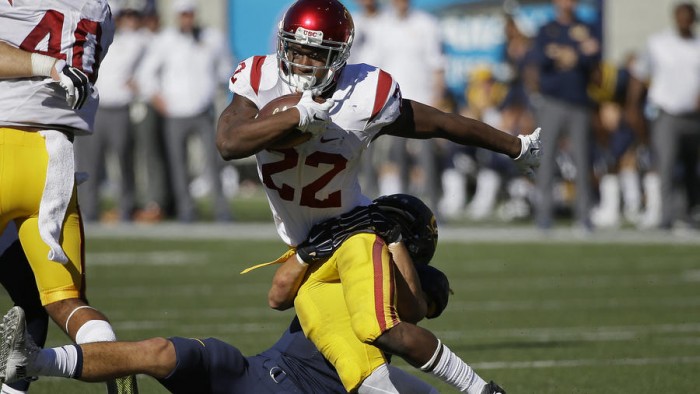 Justin Davis Carries the ball for USC Photo:  AP/Eric Risberg