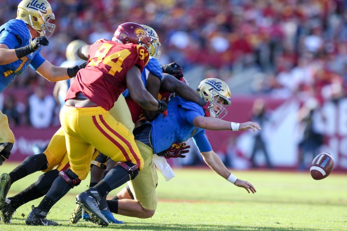 Defensive End Rasheem Green Recovers Fumble for Trojan TD. Photo:  Jordon Kelly