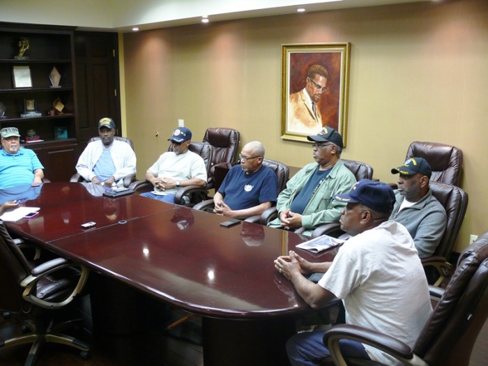 (From Left-to-Right): Vietnam veterans Garnett Overby, Arthur Jarrett, Ronald Jackson, Ramon Roberts, Charles O. Green, Jr., Hayward Garner and James Null speak about Veteran’s Day, PTSD and their healing process. Photo By Brian W. Carter