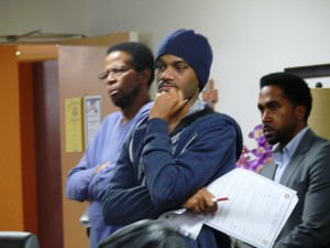 Executive Director at Crenshaw Subway Coalition, Damien Goodmon, listens to the response from his concerns on issues concerning Metro and the Crenshaw District. Photo by Brian W. Carter