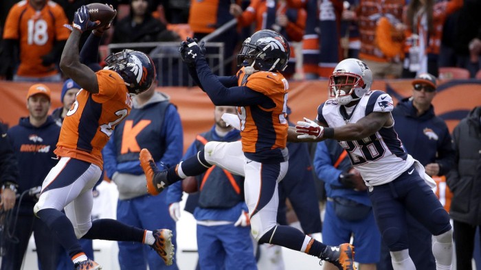 Broncos Darian Stewart intercepts a Brady pass.  Photo:  Chris Carlson/AP