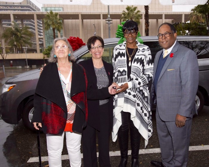 Supervisor Mark Ridley-Thomas donates a van to the Downtown Women’s Center in Skid Row. The keys are received by Francine Andrade, Anne Miskey and Teressa Percell. Ms. Miskey is the chief executive at DWC, while Ms. Andrade and Ms. Percell are formerly homeless women who have found housing through the DWC.