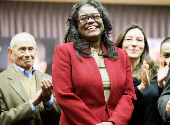 Los Angeles Unified School District Deputy Superintendent Michelle King is named the district's next superintendent by members of the board of education during a news conference Monday in Los Angeles. At left is former Los Angeles Unified School District Superintendent Ramon Cortines.  (DAMIAN DOVARGANES , AP PHOTO)  