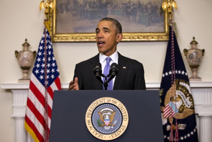 President Barack Obama speaks about the release of Americans by Iran, Sunday, Jan. 17, 2016, in the Cabinet Room of the White House in Washington. (AP Photo/Jacquelyn Martin)