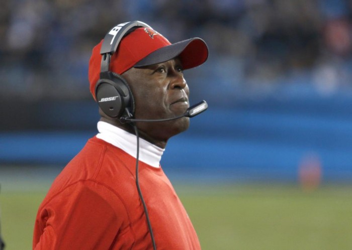 FILE - In this Jan. 3, 2016, file photo, Tampa Bay Buccaneers coach Lovie Smith watches his team take on the Carolina Panthers during an NFL football game in Charlotte, N.C. The Buccaneers fired Smith on Wednesday night, Jan. 6. Smith went 6-10 this year and 8-24 over two seasons in charge of the team. The announcement came as a surprise to many because Smith's job was not considered to be in danger.(AP Photo/Bob Leverone, File)