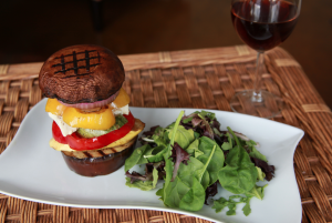 Chef Jess' vegan mushroom burger with side salad.