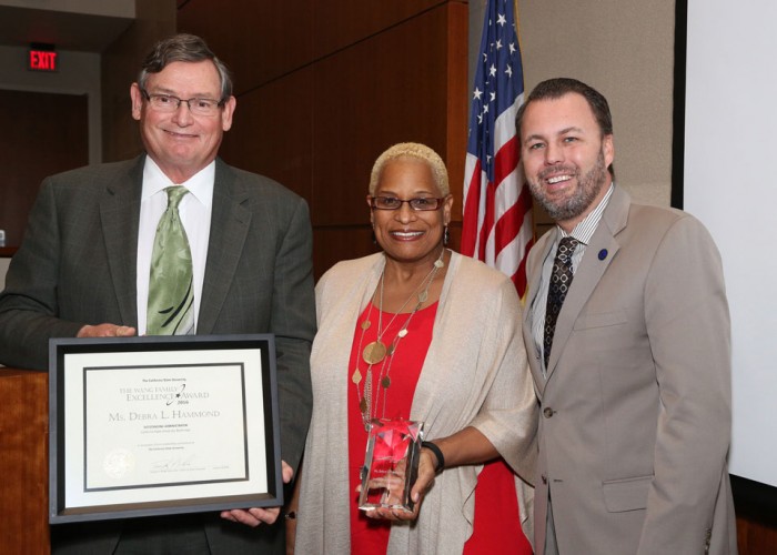 From left, CSU Chancellor Timothy White, Debra Hammond and CSU Board of Trustees Chair Lou Manville shortly after Hammond was presented with her award at a CSU board meeting in Long Beach. Photo courtesy of the CSU Chancellor's Office. (courtesy photo)