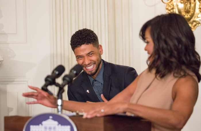  On Wednesday, February 24, in the State Dining Room of the White House, Jussie Smollett laughs as First Lady Michelle Obama introduces him at the student workshop: “The Musical Legacy of Ray Charles.” | Photo by Cheriss May, Howard University News Service