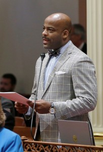  In this photo taken Friday, Feb. 12, 2016, state Sen. Isadore Hall, D-Compton, addresses the Senate in Sacramento, Calif. Hall's proposal to include race and ethnicity in California's fair pay law is expected to face an uphill battle against business interests and skeptical insiders. (AP Photo/Rich Pedroncelli)