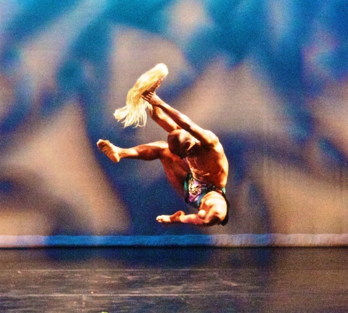 Michael Tomlin III leaps in the air in Global Village choreographed by Lula Washington, was part of a shared concert with Pony Box Dance Theatre on Saturday, April 2, at Nate Holden Performing Arts Center. (Photo by E. Mesiyah McGinnis for the L.A. Sentinel)