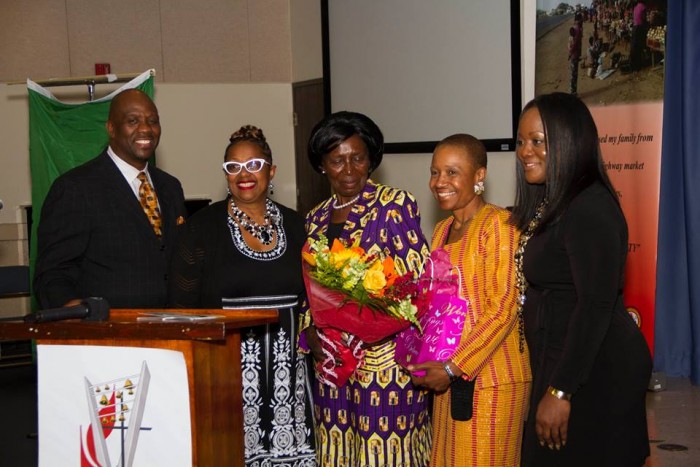 Presenting flowers to Vice President Wina  are (left to right) Pastor Sauls, Rev. Judi Wortham-Sauls, Eulanda Matthews, Esq., and Judge Patti Titus.  (photo by Jules Green)