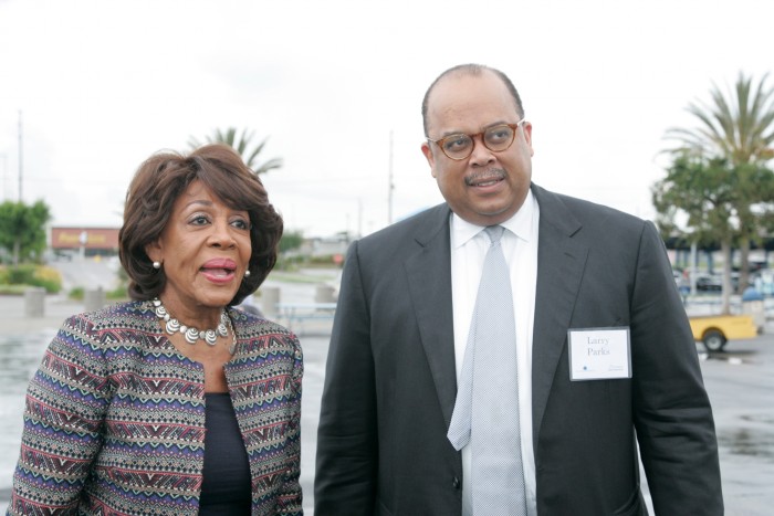 Congresswoman Waters and Larry Parks from the Federal Home Loan Bank of San Francisco. (Photo by Mike Jones)