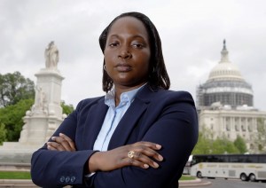 In this photo taken May 13, 2016, Mary Tobin, wearing her West Point class ring, poses for picture in Washington, Friday, May 13, 2016. Self-expression is hardly a part of life for cadets at the United States Military Academy at West Point.Tobin, who has mentored other black women cadets since graduating in 2003, said the experience is one rarely discussed publicly. (AP Photo/Manuel Balce Ceneta)