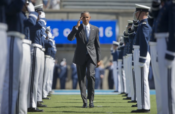 President Barack Obama returns a salute as he arrives to deliver his final commencement address to the 2016 class U.S. Air Force Academy, Thursday, June 2, 2016, in Colorado Springs, Colo. (AP Photo/ Pablo Martinez Monsivais)