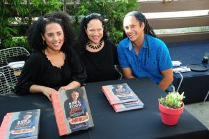 Mother-and-daughter authors of the cookbook, “Soul Food Love,” Alice Randall and Caroline Randall Williams are all smiles with master chef Govind Armstrong at the 2015 Leimert Park Village Book Fair. Photos Courtesy of Exum and Associates