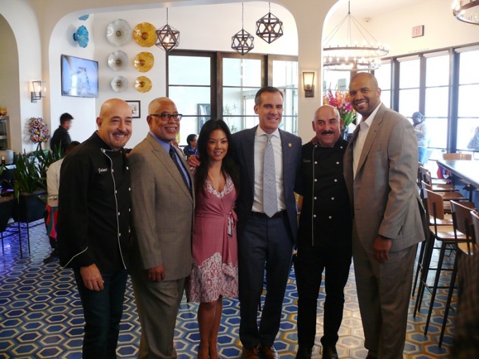 (From Left-to-Right): Chef Jaime Martin del Campo, Crenshaw Chamber of Commerce president and CEO Armen Ross, Marketing Director at Baldwin Hills Crenshaw Plaza, Capri Capital Partners, Angeline Buenaventura, Mayor Eric Garcetti, chef Ramiro Arvizu and Community Outreach Director, Media Relations and Political Liaison at Baldwin Hills Crenshaw Plaza, Jason Lombard.