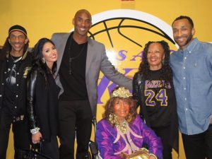 From left are Harvey Estrada, Bettye’s son-in-law, Vanessa Bryant, Kobe Bryant, Bettye Nichols (seated), Cheryl Estrada, Bettye’s daughter; and Joshua Estrada, Bettye’s grandson.