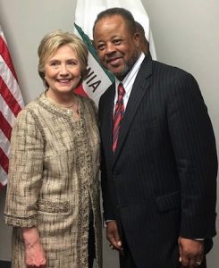 Pastor Rumph and U.S. presidential candidate Hillary Clinton.