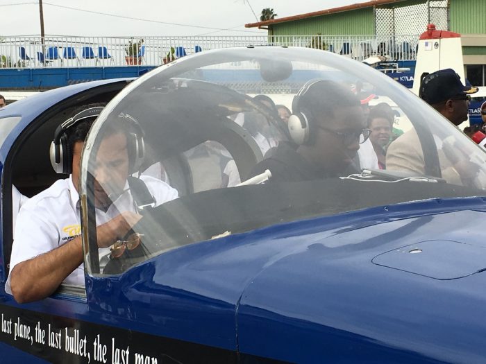 Isaiah and TAM flight instructor Roger Azad prepare for takeoff.