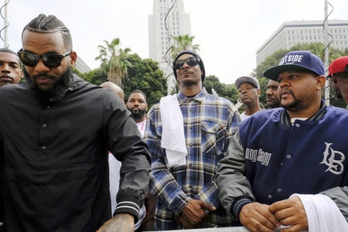 As the July 8, 2016 LAPD graduation ceremony was taking place, a group of protesters gathered on a nearby sidewalk, with rapper Snoop Dogg among them, but they did not attempt to disrupt the proceedings. (AP file photo)