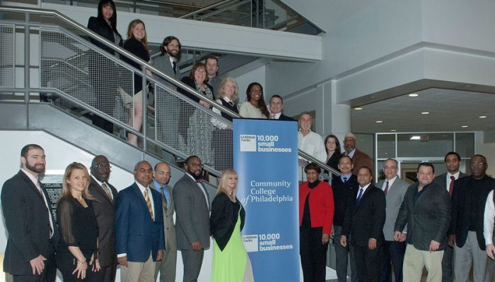 GS1 Alumni from the Goldman Sachs “10,000 Small Businesses” gather at a recent program in Philadelphia with city officials and a top Goldman Sachs executive. (Goldman Sachs)