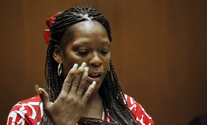 Laura Moore, speaks to Lonnie Franklin Jr. as she recalls being shot six times by him on May 5, 1984 during victims impact statements before he was sentenced in Los Angeles Superior Court Wednesday, Aug. 10, 2016. Franklin was sentenced to death for the murders of nine women and a teenage girl that went unsolved for years as the body count grew in a poor section of Los Angeles haunted by the scourge of crack cocaine. (Al Seib/Los Angeles Times via AP, Pool)