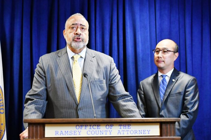 Former U.S. Department of Justice attorney Don Lewis, left, speaks after being added to Ramsey County Attorney John Choi's, right, team as they investigate the July 6 death of Philando Castile in suburban St. Paul, Minn. (Glen Stubbe/Star Tribune via AP)