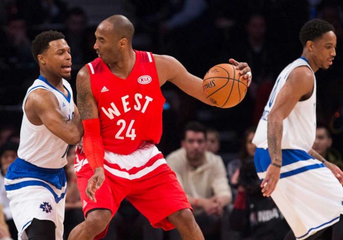 Western Conference's Kobe Bryant, of the Los Angeles Lakers (24) tries to move the ball past Eastern Conference's Kyle Lowry, of the Toronto Raptors, left, during the first half of the NBA all-star basketball game, Sunday, Feb. 14, 2016 in Toronto. (Mark Blinch/The Canadian Press via AP) MANDATORY CREDIT