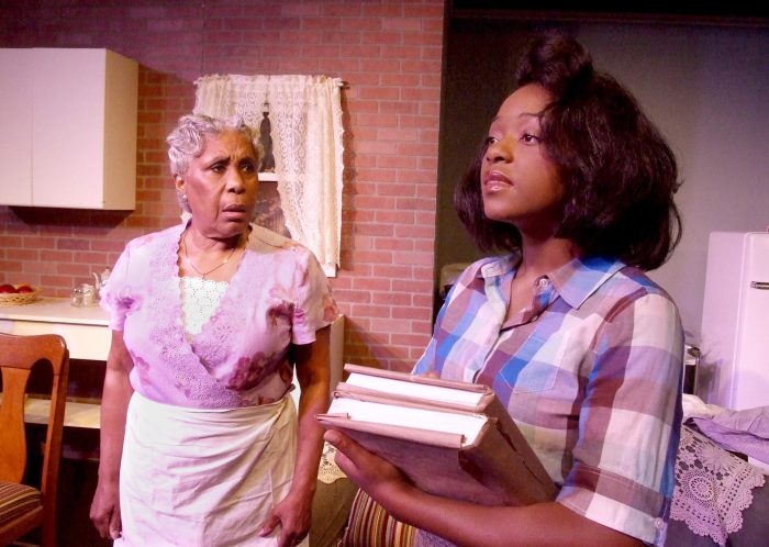  Lena "Mama" Younger (Starletta DuPois) looks on in disappointment at the words daughter Beneatha (Charlotte Williams) professed about her faith in God. (Courtesy Photo) 