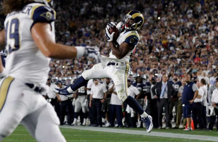 Los Angeles Rams running back Aaron Green leaps to make a catch against the Dallas Cowboys in the second half of a preseason NFL football game, Saturday, Aug. 13, 2016, in Los Angeles. Green ran the reception in for a touchdown (Ryan Kang, AP)