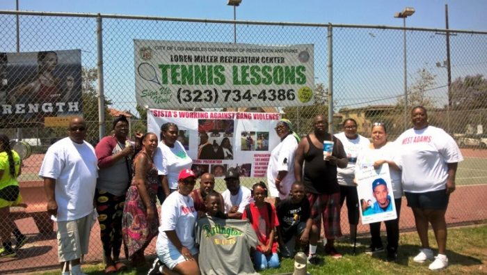 S.W.A.G.V. members at Loren Miller Park distributed school supples to children on July 31 (Courtesy Photo) 