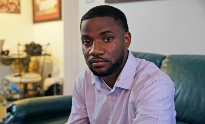 FILE - In this Thursday, Aug. 25, 2016, file photo, Dominique Alexander poses for a photo at his apartment in Dallas. Alexander, a leader of the protest where a sniper killed multiple law enforcement officers in Dallas was ordered to prison Friday, Aug. 26, 2016, for unrelated probation violations. (AP Photo/LM Otero, File)