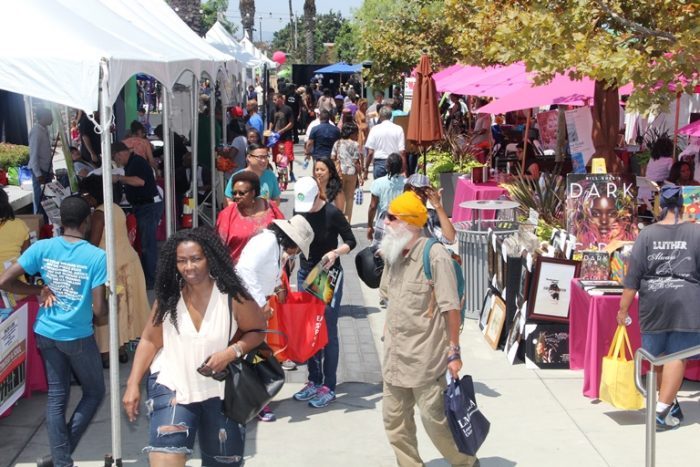 Thousands of book lovers flocked to the 10th Annual Leimert Park Village Book Fair at the outdoor promenade of the Baldwin Hills Crenshaw Plaza on Aug. 20 in Los Angeles. Photo by Malcolm Ali