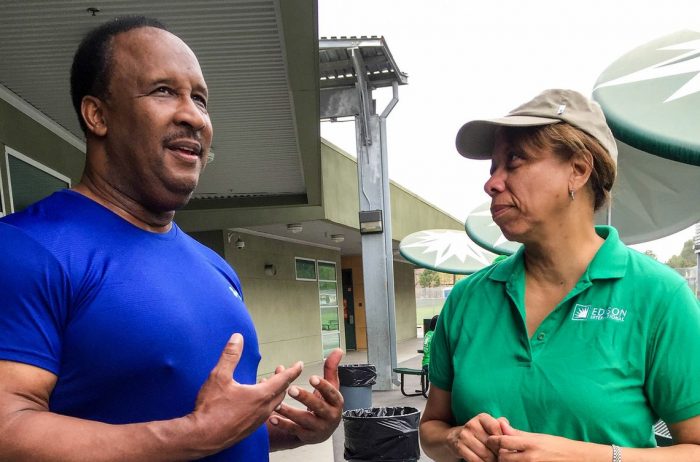  Inglewood Mayor James Butts and Janet Clayton, Edison International Corporate Communications Senior Vice President, chat about the importance of building a community garden for kids. (Photo by Glennetta Green)