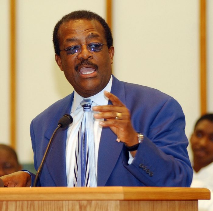 Defense attorney Johnnie Cochran speaks at a local prayer rally for prison journalist Wilbert Rideau on Sunday, June 1, 2003, in Lake Charles, La. Defense lawyers want a fourth murder trial of Rideau to be in Baton Rouge, La., and not Lake Charles. The lawyers filed court papers Friday saying that the 19th Judicial District in East Baton Rouge has jurisdiction over the 1961 murder case since a retrial took place there in 1964. (AP Photo/American Press, Ricky Hickman)