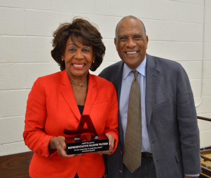 Los Angeles Area Volunteer Leader David Crippens presents Representative Maxine Waters (CD 43) with AARP’s “Champion of 50+” award.