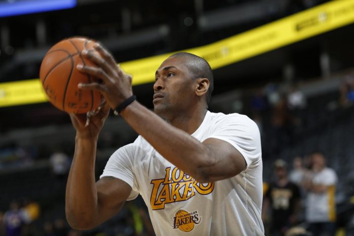 Metta World Peace will get a shot to make the Lakers roster in training camp. (AP Photo/David Zalubowski)